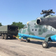 Illustration for article titled Ukrainian Mi-24 Hind Shot Down, Towed Away By Truck